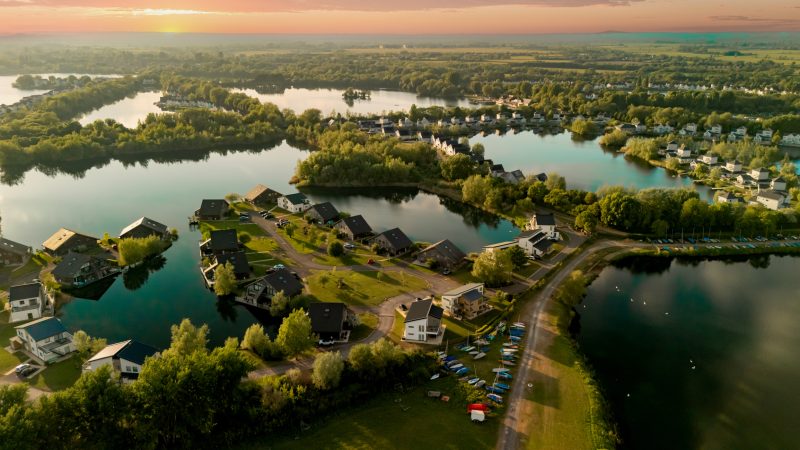 Drone shot of Waters Edge Lake Managed by Be HERE STAYS