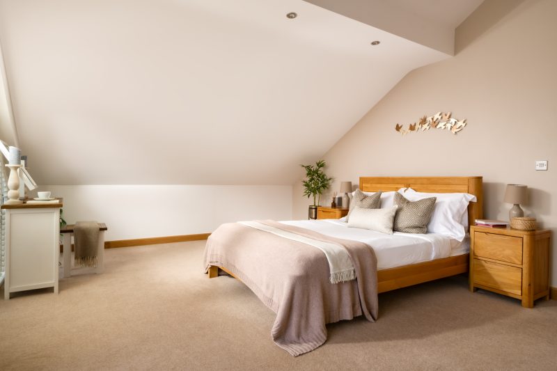 Grebe Lodge - Master Bedroom with a cosy bed