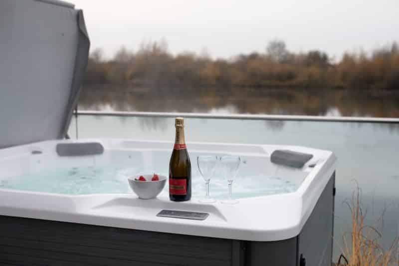 Lakeside view from Egret Lodge, a luxury lake lodge in the Cotswolds