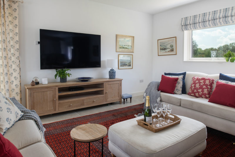 Relaxed lounge at a lakeside luxury stay in the Cotswolds