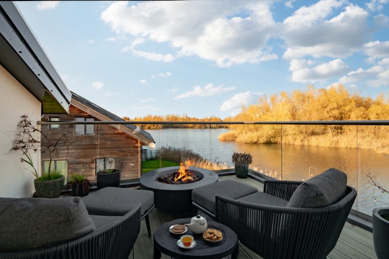 Scandinavian lakeside lodge with uninterrupted waters views in The Cotswolds